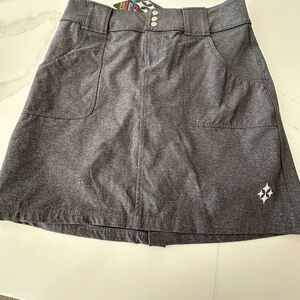 Brand new with tagsGray skort  for golf or tennis has pockets